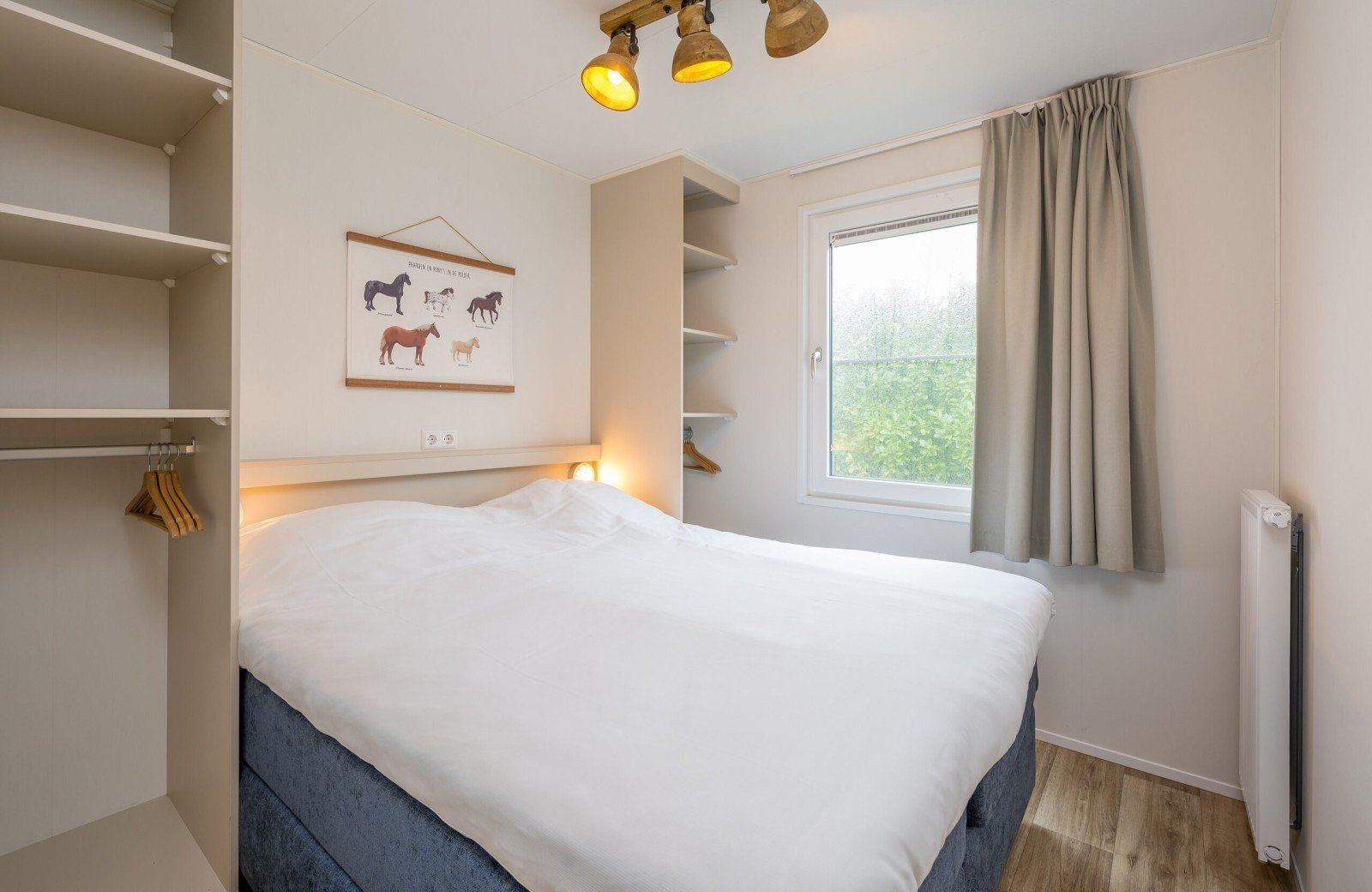 Stip de pony huisje slaapkamer bij Familie Resort Molenwaard